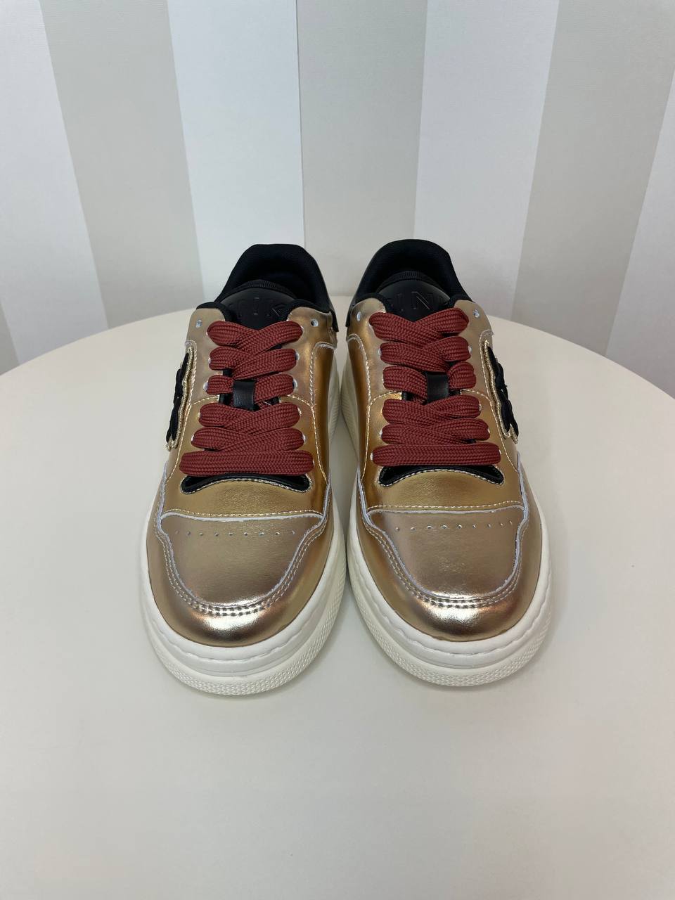 Sneakers in pelle laminata Pinko